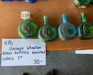 #278	Vintage (4) 3" face color bottles 	 $30.00 			
