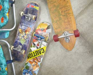 Tommy Bahama chairs 2 skate boards 1 long board