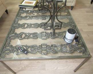 Glass and iron coffee table