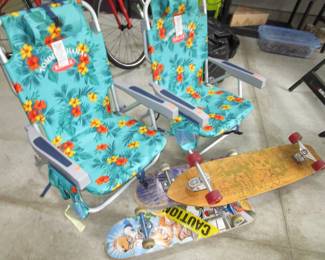 Tommy Bahama chairs 2 skate boards 1 long board