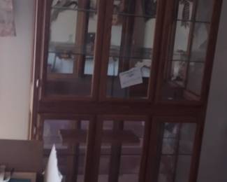 Smaller Oak Hutch $50 with 5 glass shelves, and light.