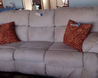 90" long tan couch with 2 recliners $5, good condition but has some stains.