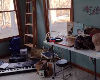 Hats, games, elec piano, step stool, CDs, Dog Toys, Dog Mats, all included in the $5 fill a bag sale