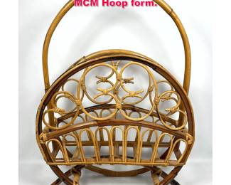 Lot 542 Rattan Magazine Holder. Modernist MCM Hoop form.
