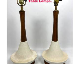 Lot 433 Pair 50s Modern Walnut and Pottery Table Lamps. 