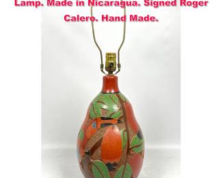 Lot 453 Roger Calero Pottery Toucan Bird Lamp. Made in Nicaragua. Signed Roger Calero. Hand Made.