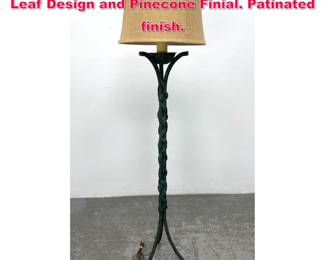 Lot 537 Decorative Iron Floor Lamp with Leaf Design and Pinecone Finial. Patinated finish.