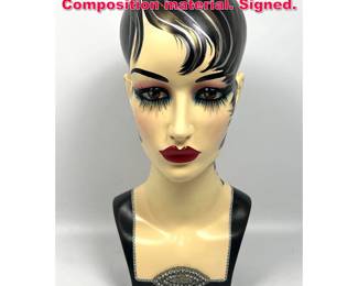Lot 51 ALBA 07 Painted Mannequin head. Composition material. Signed. 