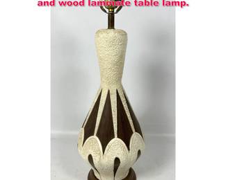 Lot 282 Mid Century Modern Chalk ceramic and wood laminate table lamp.