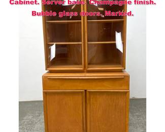 Lot 456 Heywood Wakefield China Display Cabinet. Server base. Champagne finish. Bubble glass doors. Marked.