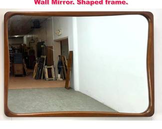 Lot 494 Vintage Mid Century Walnut Frame Wall Mirror. Shaped frame.