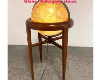 Lot 68 Mid Century Modern Light up Floor Globe. Mahogany stand. 