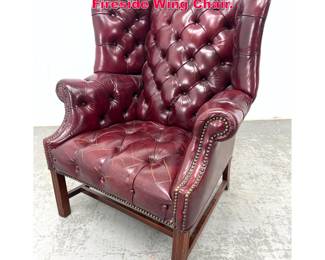 Lot 301 Chesterfield Style Tufted Leather Fireside Wing Chair. 