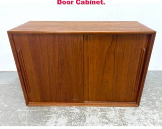 Lot 194 Danish Modern Teak Sliding Door Cabinet. 
