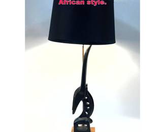 Lot 258 Tall Abstract rams head lamp. African style.
