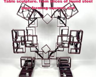 Lot 195 Joe Seltzer Burgundy squares Table sculpture. from slices of found steel pipe forming squares and 