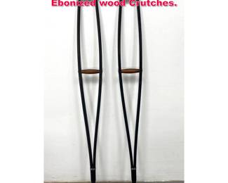 Lot 178 Pair Vintage Mid Century Modern Ebonized wood Crutches.