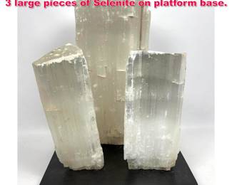 Lot 597 Geology rock specimens Sculpture. 3 large pieces of Selenite on platform base.