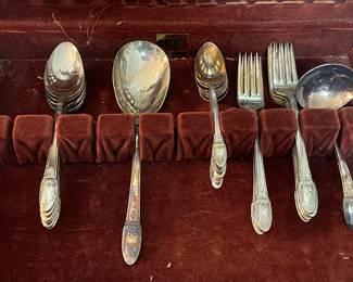 One of two sets of silver plate flatware