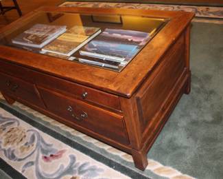 Glass view coffee table with drawers. Very nice.