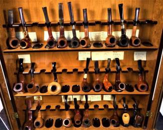 The sale includes  a collection of handmade tobacco pipes.
