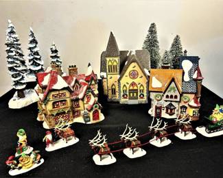 A Large Collection of Dicken's Village and North Pole Series from the Heritage Collection Complete with Accessories!