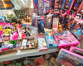 LOTS of Barbie dolls, Barbie clothes & accessories. Most are still new in box. Other dolls & accessories as well.