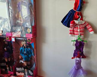 LOTS of Barbie dolls, Barbie clothes & accessories. Most are still new in box. Other dolls & accessories as well.