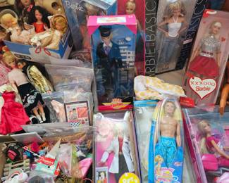 LOTS of Barbie dolls, Barbie clothes & accessories. Most are still new in box. Other dolls & accessories as well.