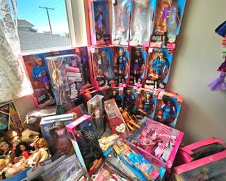 LOTS of Barbie dolls, Barbie clothes & accessories. Most are still new in box. Other dolls & accessories as well.