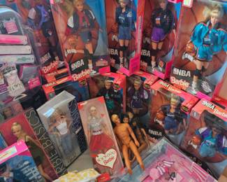 LOTS of Barbie dolls, Barbie clothes & accessories. Most are still new in box. Other dolls & accessories as well.