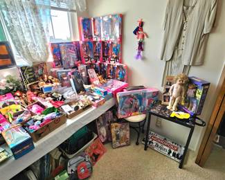 LOTS of Barbie dolls, Barbie clothes & accessories. Most are still new in box. Other dolls & accessories as well.