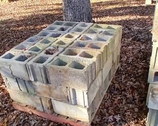 Numerous blocks some on pallets