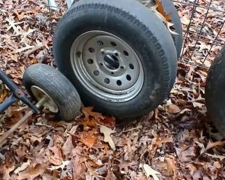 2 12" utility trailer wheels and tires.