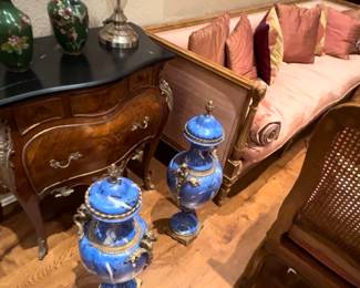 Louis XVI furnishings and marble and bronze urns