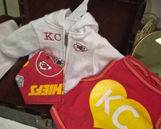 Pet accessories.  K. C. Chiefs puppy clothes