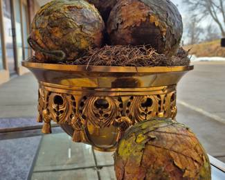 Much brass. Solid brass bowl and brass trim w/ beveled glass top end tables