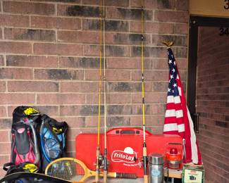 Much outdoor and sporting items. "Body Glove" snorkel sets, Frito Lay table, Coleman items and vintage bow