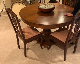 Beautiful antique table with 3 leaves and 6 chairs and extra fabric for chairs