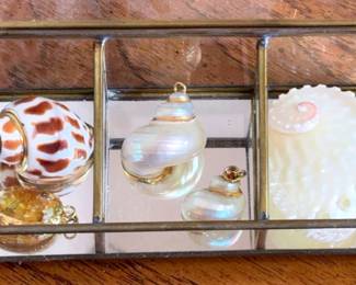 Shell Pendants Embellished With Gold
