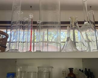  Large assortment of chemistry beakers and other items