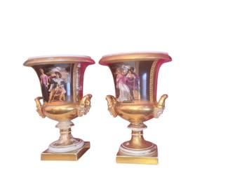 Pair of Old Paris gilt and polychrome painted urns. First half 19th Century. 