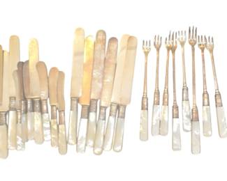 Mother of pearl knives and forks with sterling silver cuffs
