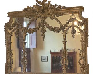 Continental carved gilt, wood and composition over mantle mirror. 19 century.
