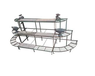 Green painted metal three-tiered planter holder