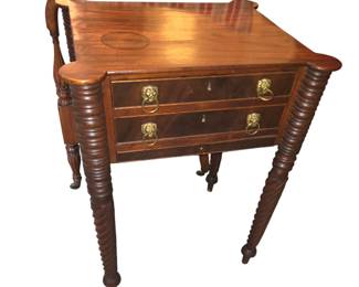 A Federal mahogany two-drawer worktable with turned legs. First quarter of 19th Century