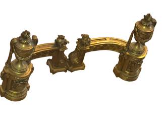 Pair of French Louis XVI style gilt bronze chenets. 19th Century