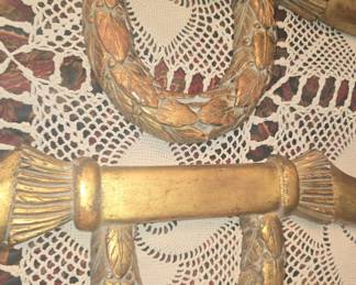 Set of seven carved and giltwood decorative elements. One antique and six copies of the antique.  