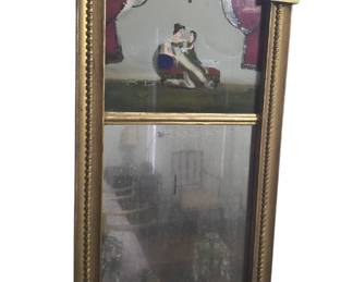 Federal giltwood and eglomise mirror. 19th Century.