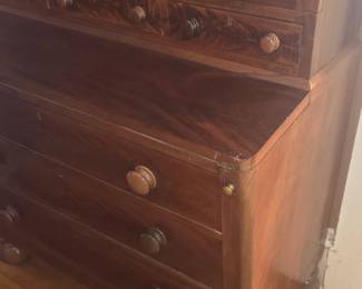 Detail of a classical mahogany secretary bookcase. First half 19 century 